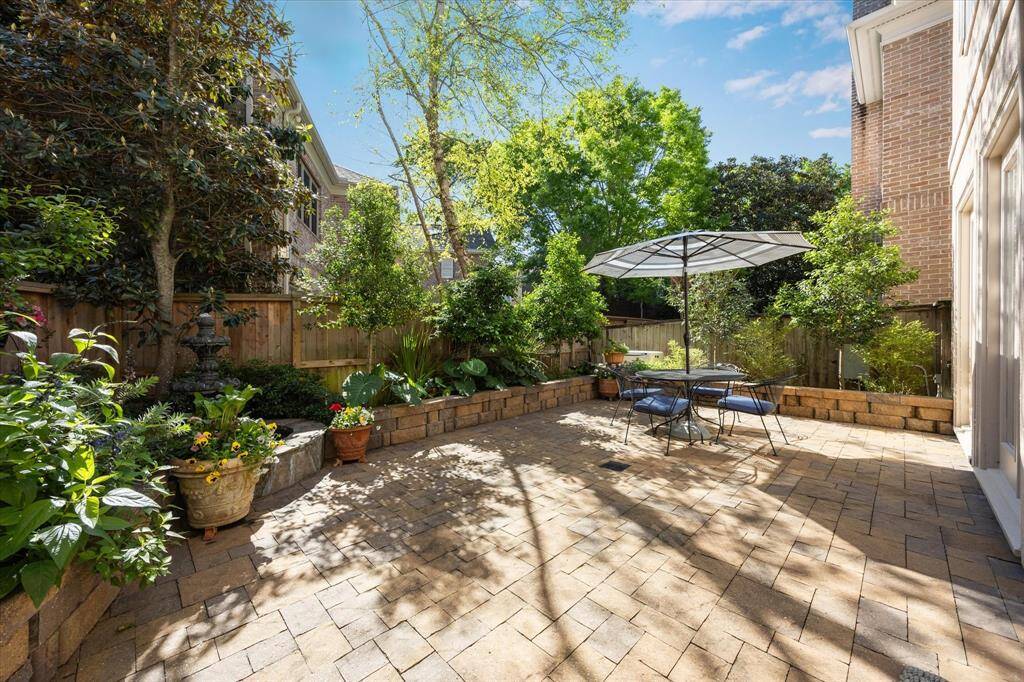 Serene patio is spacious and private for relaxing and entertaining.