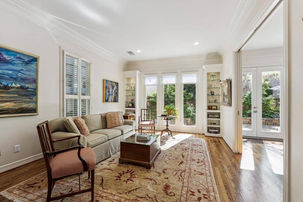 Formal living room flooded with natural light.