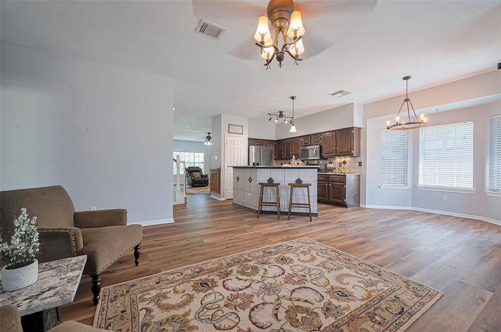 Spacious living area with an open layout to the updated kitchen and breakfast room