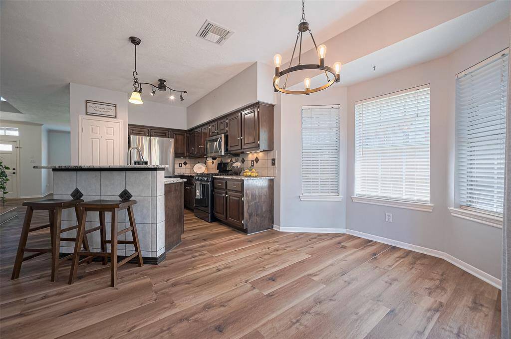 Cozy eat-in breakfast room with lots of natural light