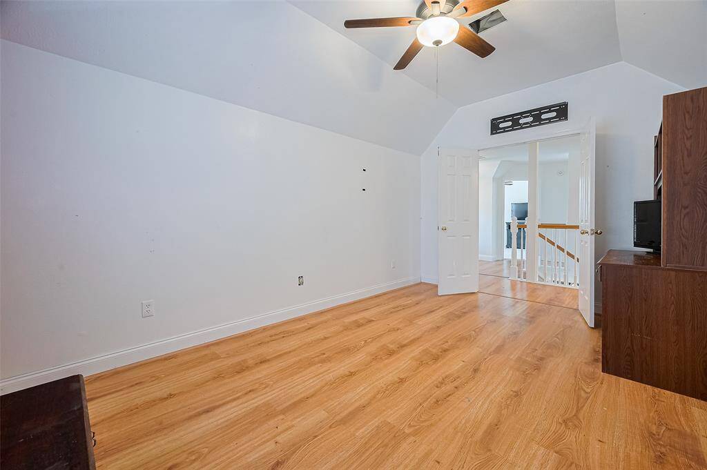 Another view of room #4, double doors and high ceilings, opposite 2 other bedrooms