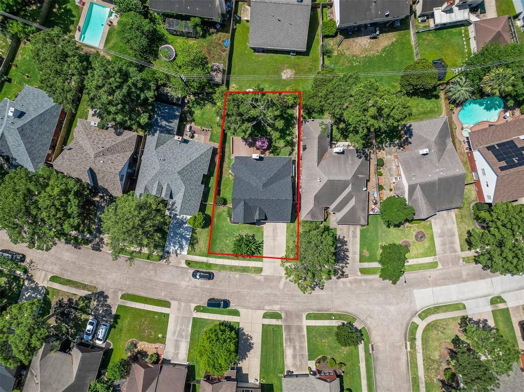 Discover your dream home from above—perfectly nestled in a vibrant neighborhood!