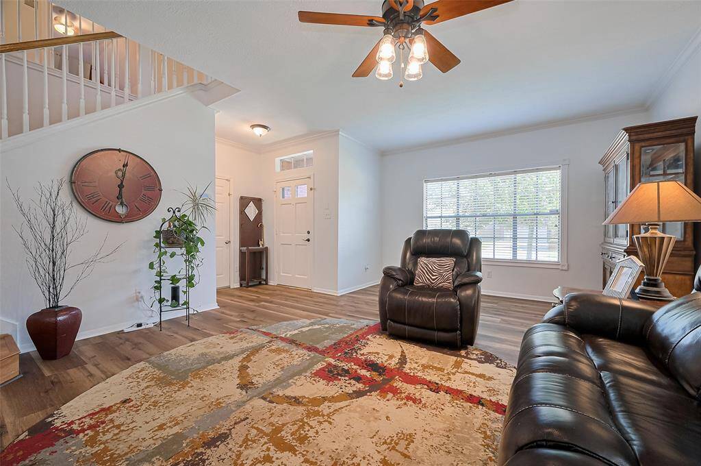 Step into a welcoming, open space to make your own, formerly considered formal dining & living combo, but this space opens up to many possibilities to fit your life!