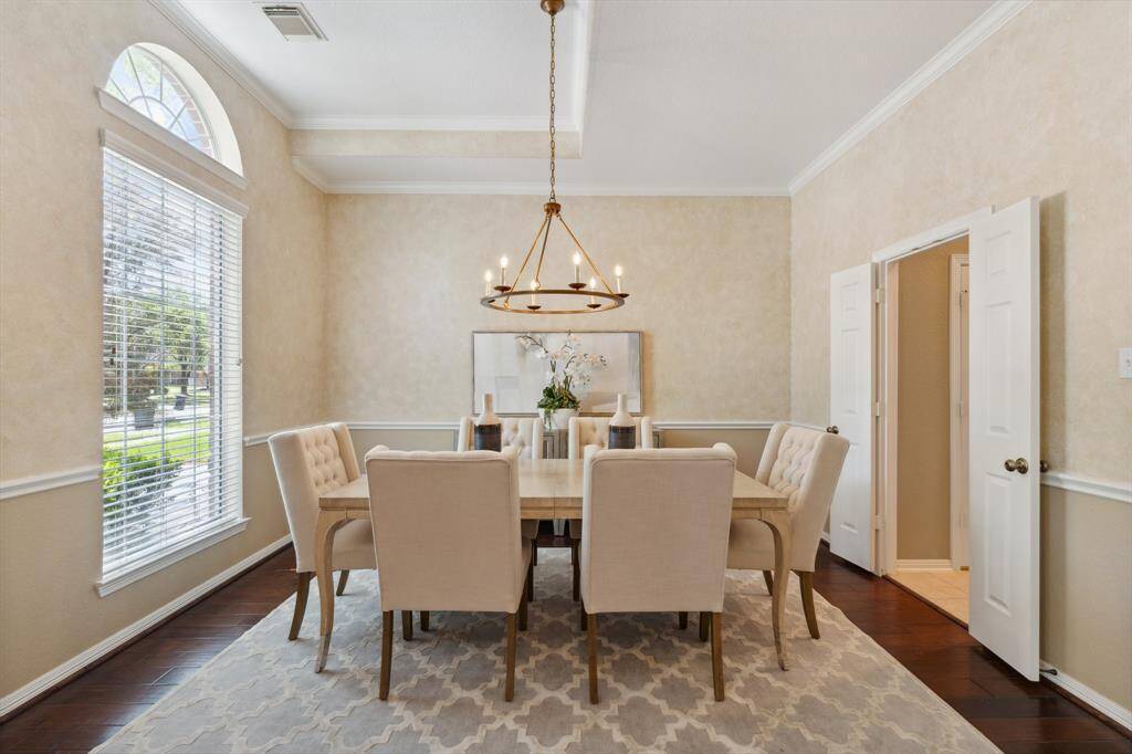 The formal dining room is located just off the kitchen at the front of the home.