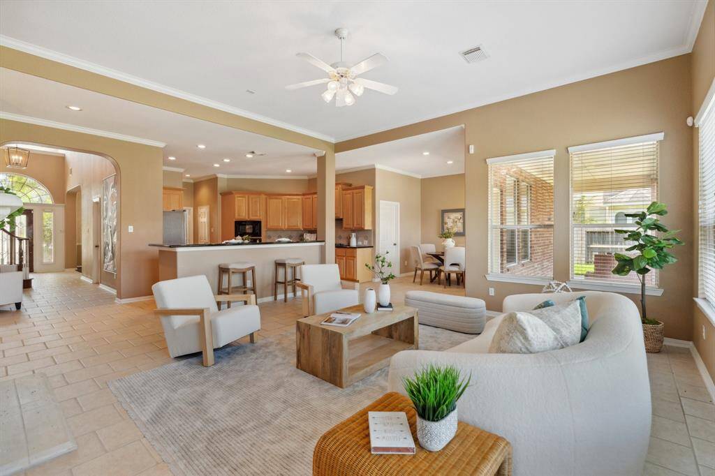 A view of the seamless flow of open-concept living, effortlessly connecting to the kitchen.