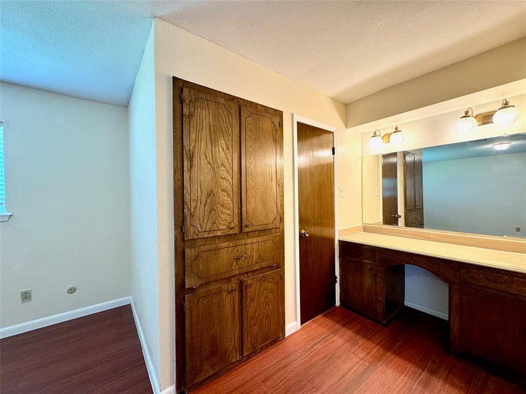 Vanity area in primary bedroom.