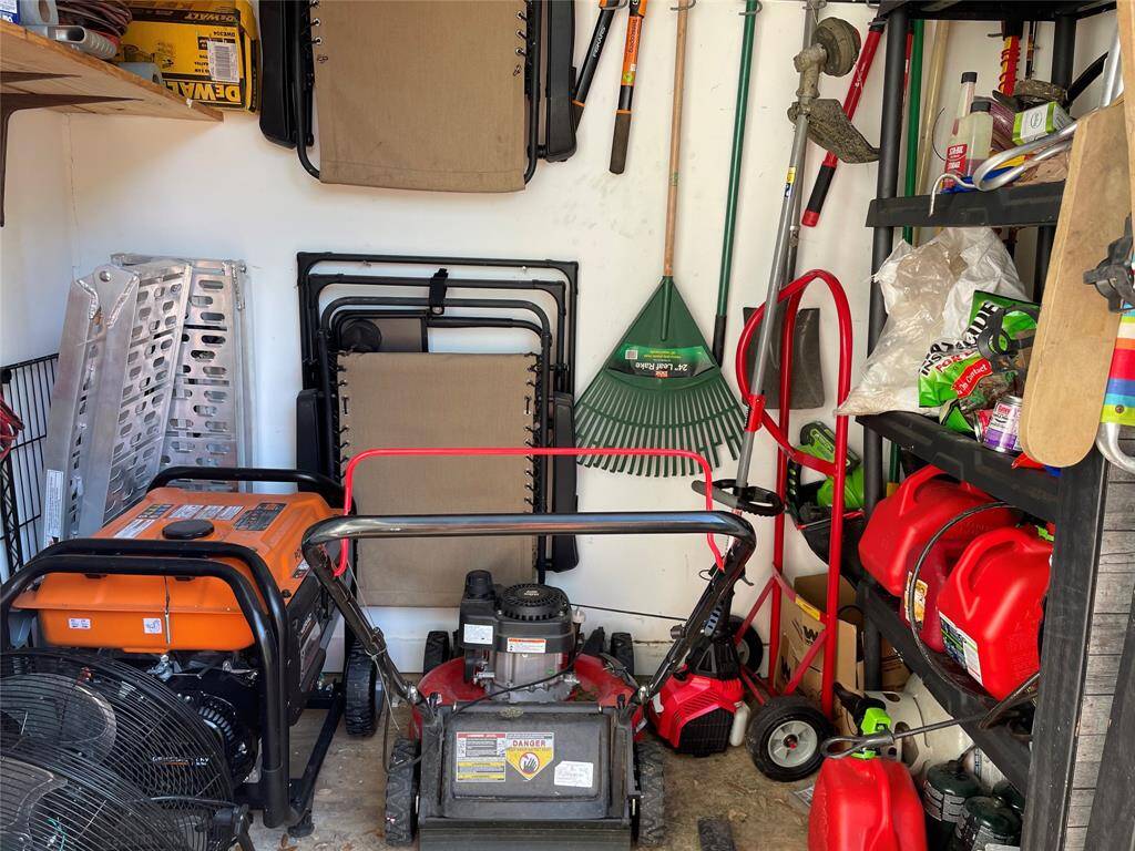 A view inside the storage closet. This space measures 8'X8'X5', so there is plenty of space to store lawn & gardening equipment as well as any other items you would typically store in a garage.