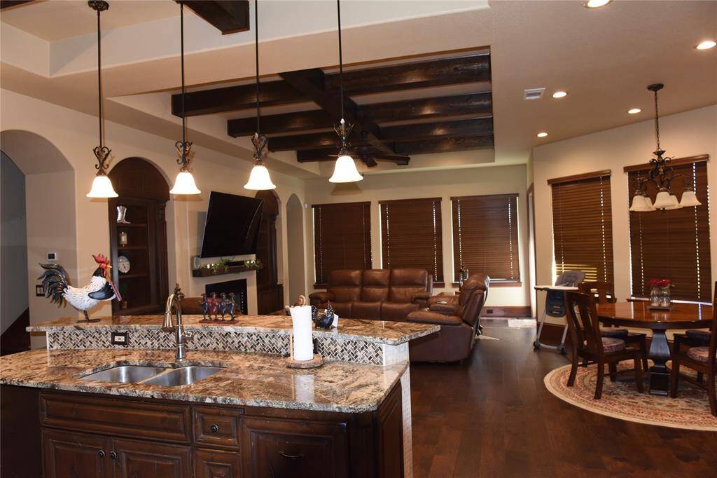 Formal Dining Room with a great view, and travertine tile flooring.