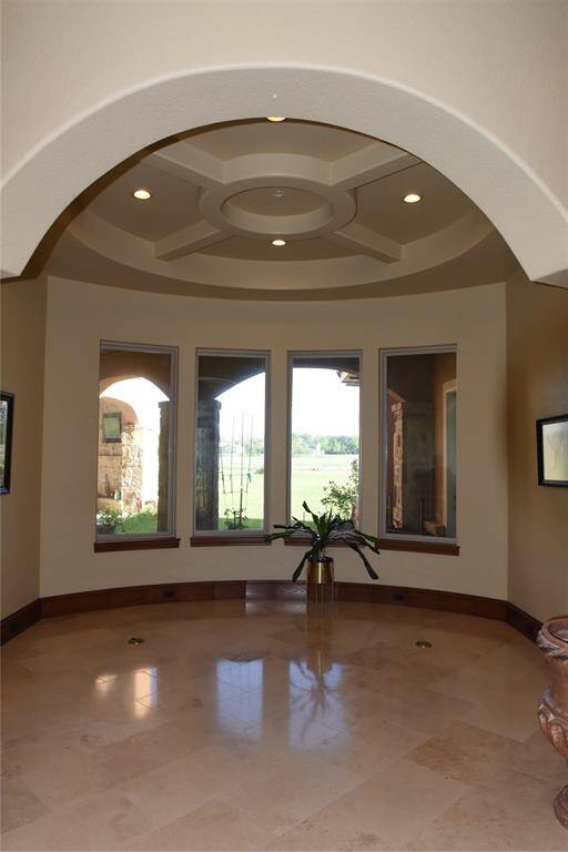 Custom arch ways throughout the house.