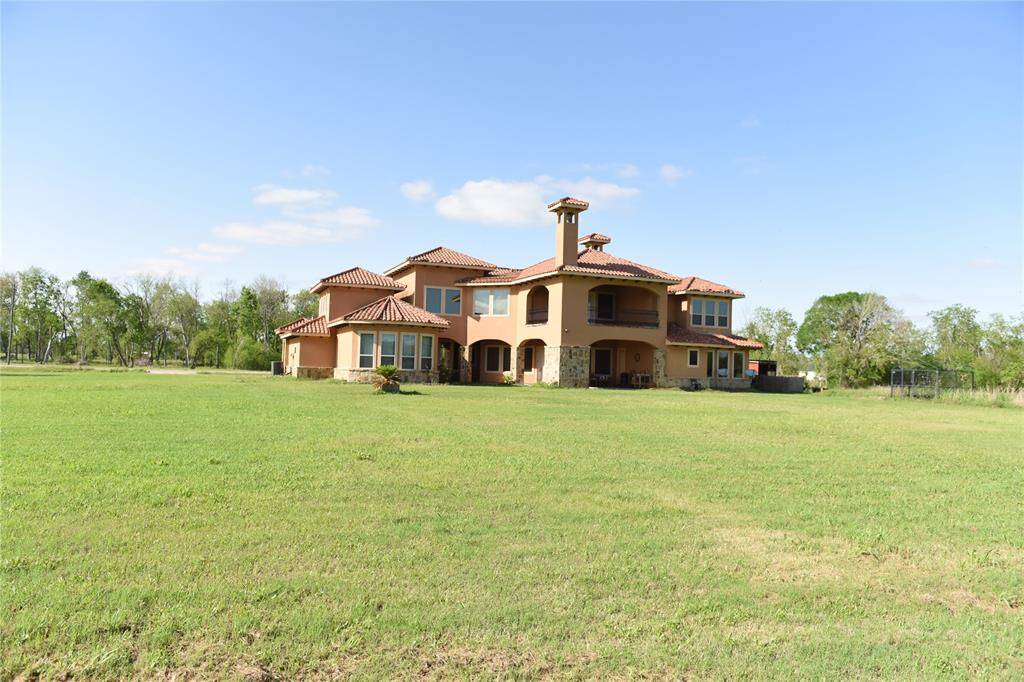 Spacious back yard on 2-acre, plenty of room for a family pool.