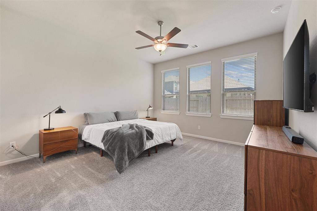 Wake up refreshed in the roomy and bright Primary Bedroom which is tucked privately in the back. It offers a relaxing escape with a walk-in closet, soaking tub, and separate shower.
