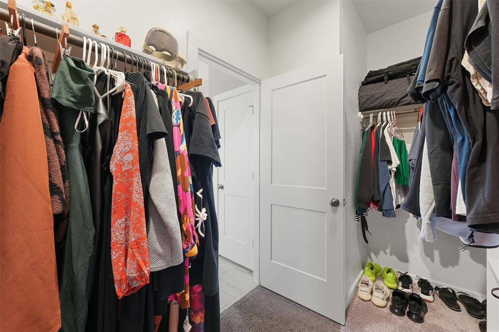 Walk-in Closet in Primary SuiteThe upstairs gameroom offers a versatile area for entertainment, games, or a cozy movie night.