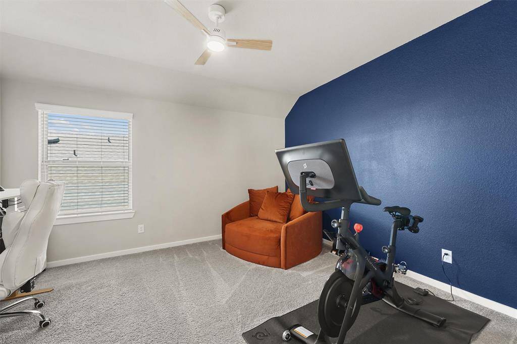 Guest Bedroom currently used as a home office. Walk-in closet.