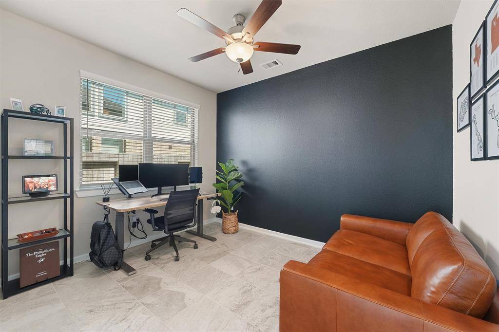The downstairs study is a perfect spot to close the french doors and focus.