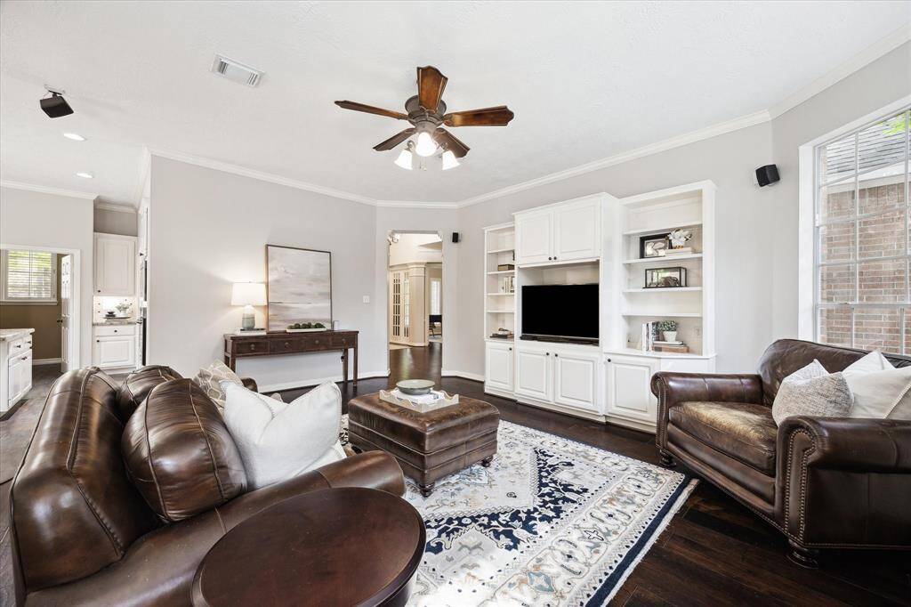 The family/living room is adjacent and open to the kitchen space.