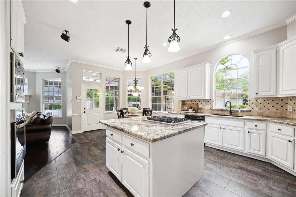 Another view of the kitchen shows what an open flow it offers.  Ample counter space and tons of cabinet storage.