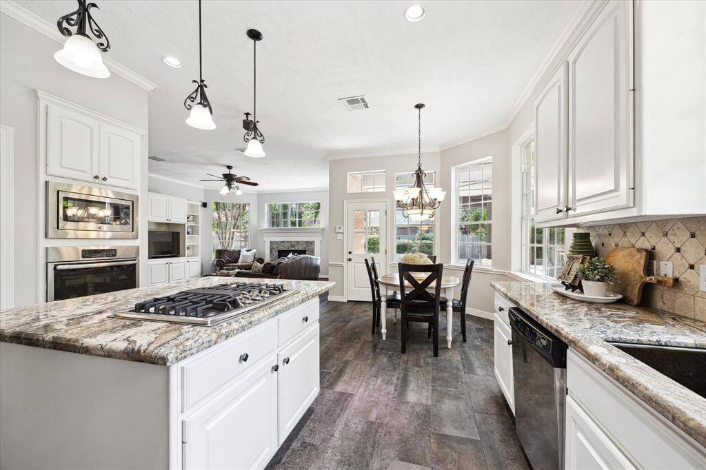 Large island with plenty of storage and room for counter seating.  Kitchen also offers a large walk-in pantry.