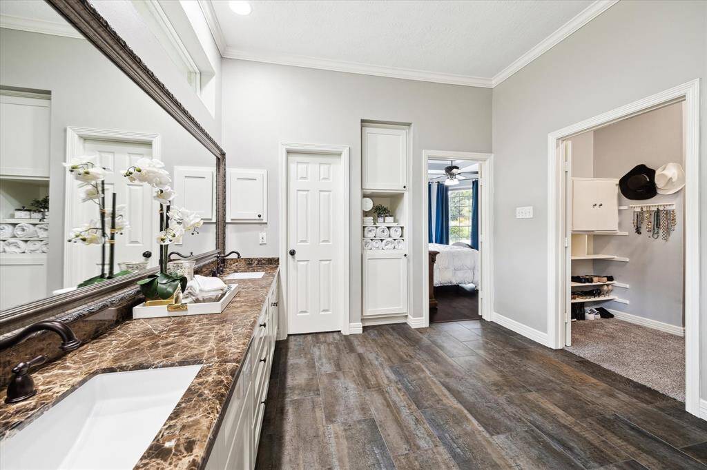 Primary suite also offers two separate large walk-in closets.