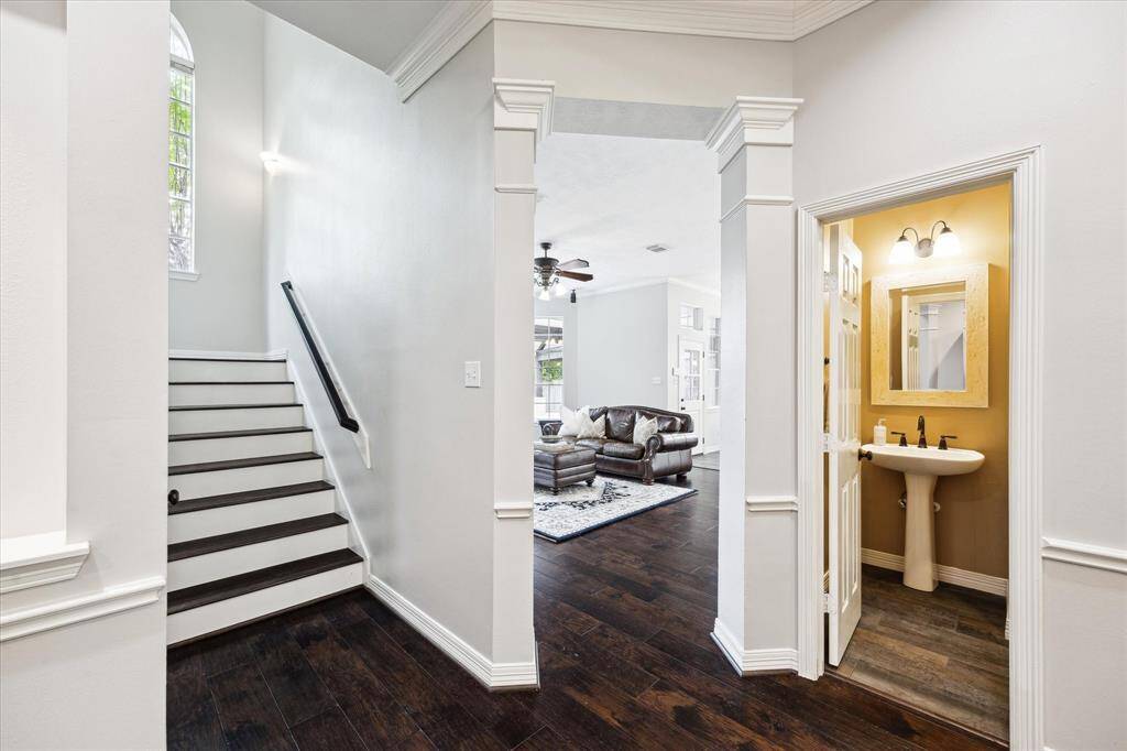 Wood flooring was carried up the stairs to the landing and game room.
