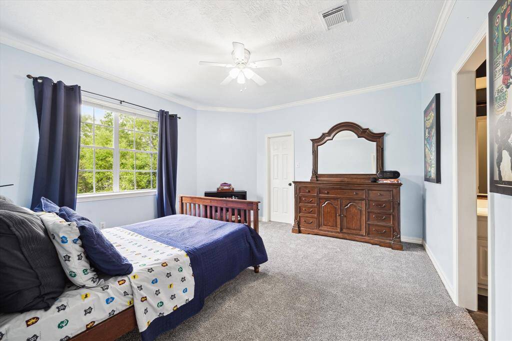Another secondary bedroom upstairs with new carpet (2025)