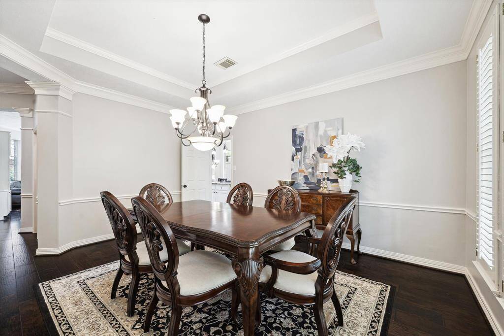 The dining room is just off the entry with pass-through access to the kitchen, great for entertaining.