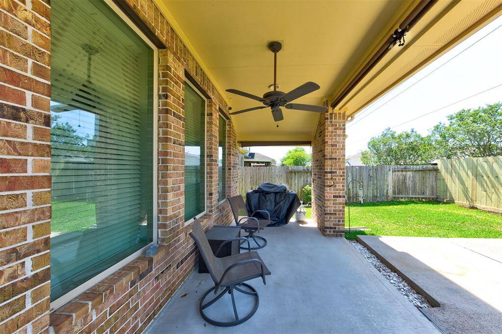 Covered back patio with natural gas valve for your grill