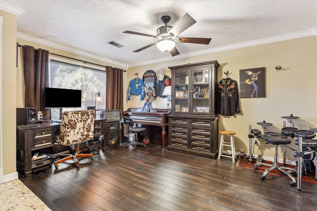 Room currently being used as a music room is also perfect as Living Room or formal Dining Room