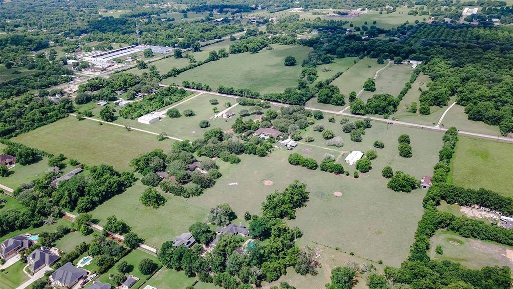 Aerial view from Westcreek Subdivision with McCrary Rd. at the top — endless potential for your business or dream estate.