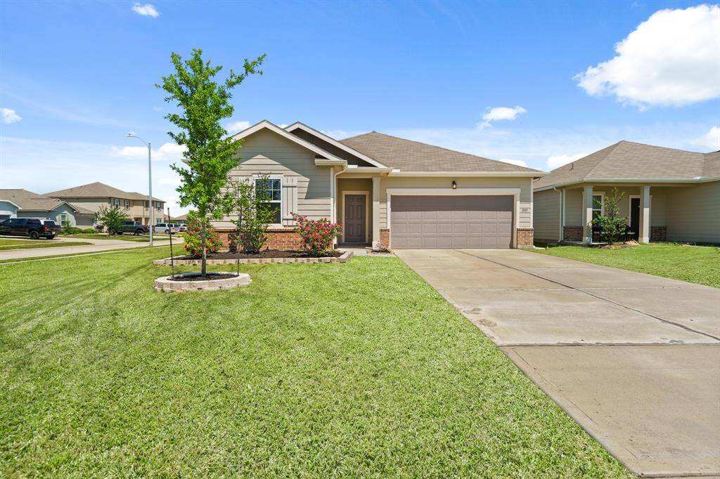 This charming home is positioned on a spacious corner lot. Paths traverse the neighborhood, providing a safe place to walk the dog and ride bikes.
