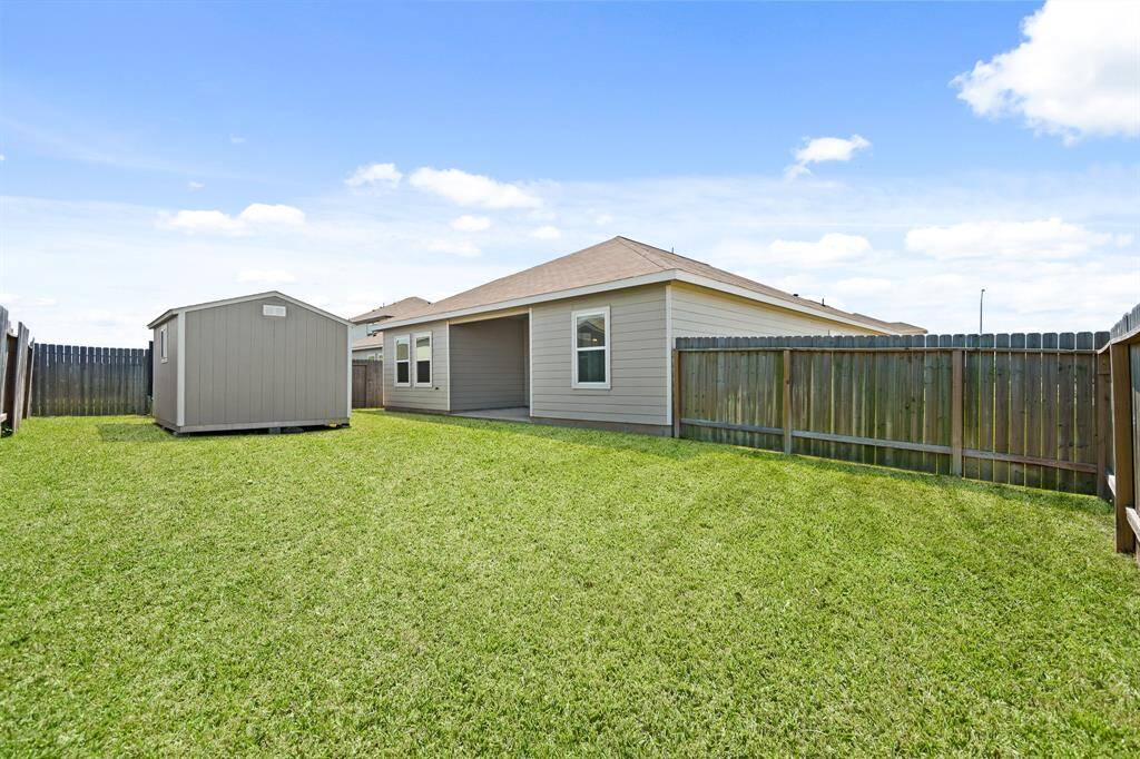 Even with the large Shed, this fully fenced Backyard has plenty of space for a playground, pool, or raised garden beds!