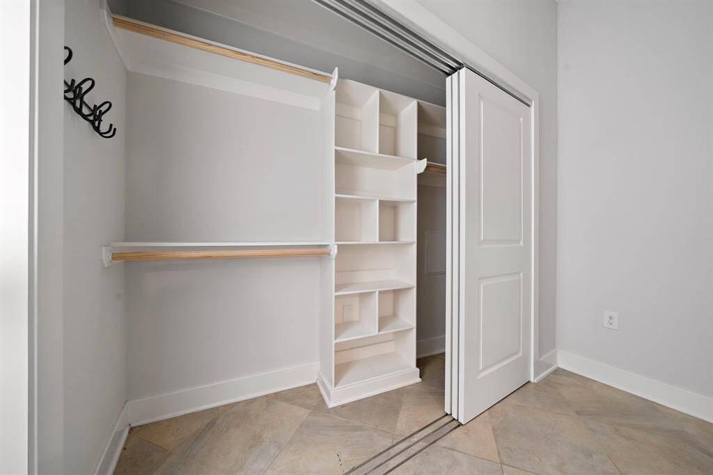 Spacious bedroom closet offering ample storage and organization for a clutter-free lifestyle!