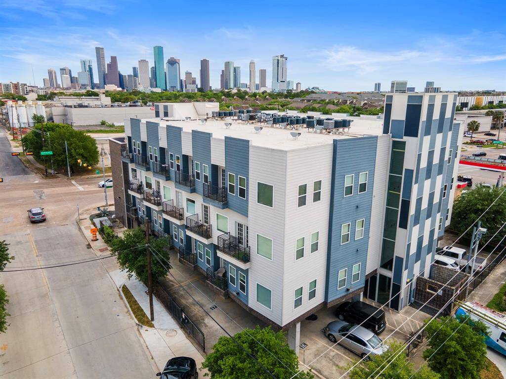 Stunning aerial view of the condo building, showcasing its prime location and modern design!