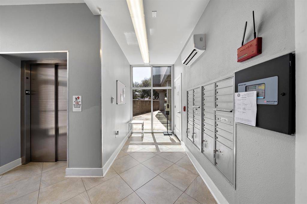 Convenient ground-floor elevator lobby featuring secure mailboxes for easy access to your deliveries.