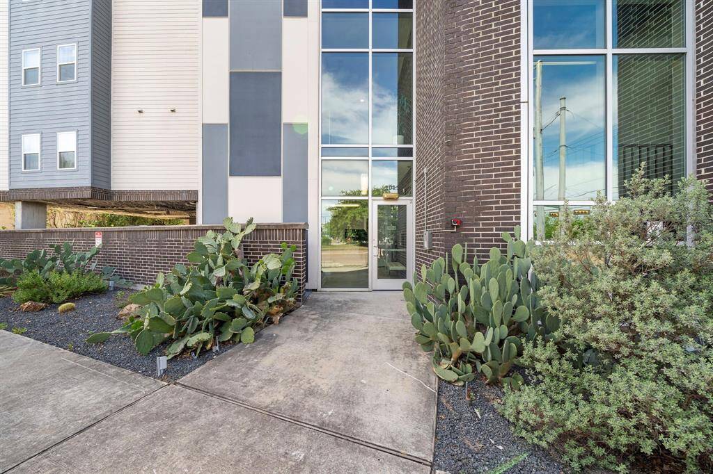 Welcoming front entrance with secure access and modern curb appeal!