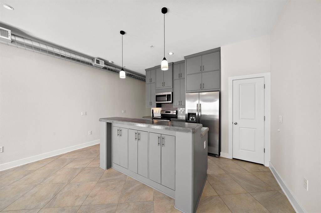 A warm and inviting kitchen designed for both style and function—perfect for cooking, gathering, and making memories.