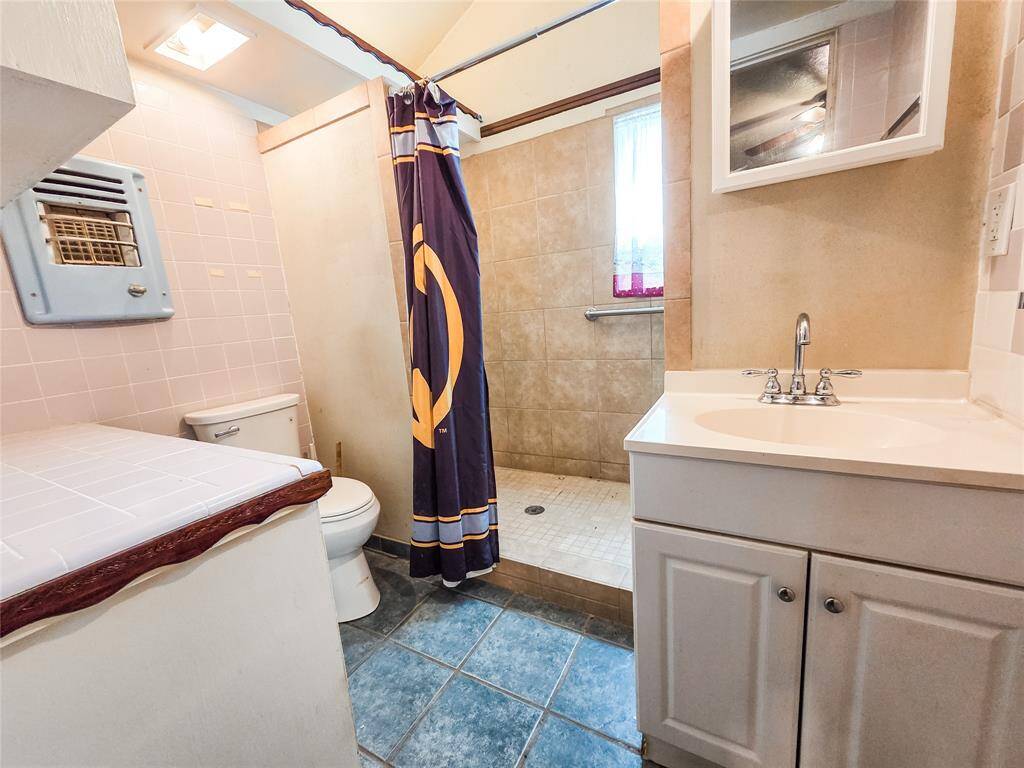 Primary bathroom with walk0in shower