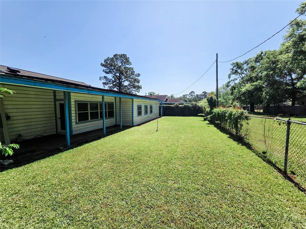 Enjoy a large, spacious backyard perfect for gatherings, gardening, or simply relaxing in the open air.
