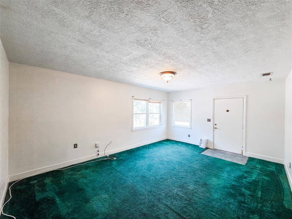 Spacious, light-filled living area perfect for relaxing or welcoming clients.