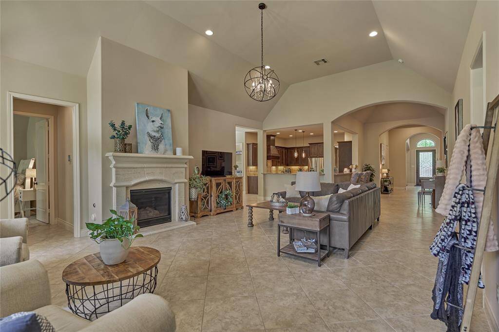 The chandelier in the primary living area enhances this already stunning space.
