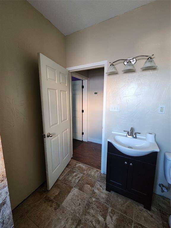 Vanity in partially remodeled bathroom
