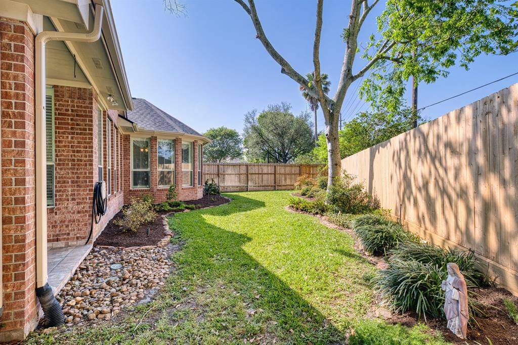 This special yard in Parkway Villages can accommodate a pool plus play equipment and more!