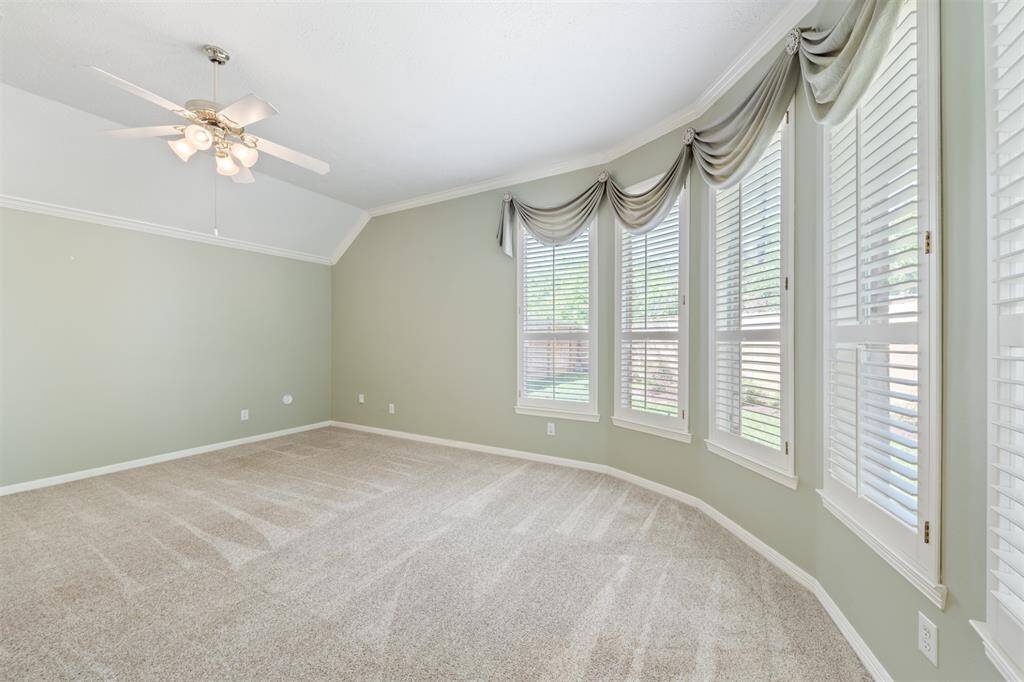 Primary Bedroom will accommodate your bedroom furniture with space by the windows for a sitting area.
