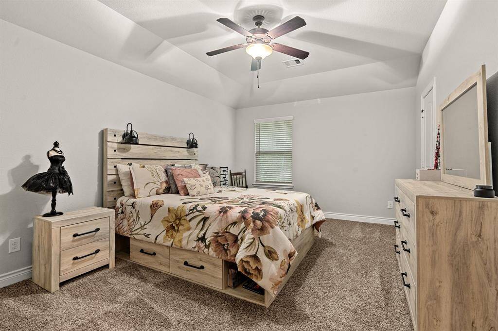 Spacious secondary bedroom featuring a large closet.