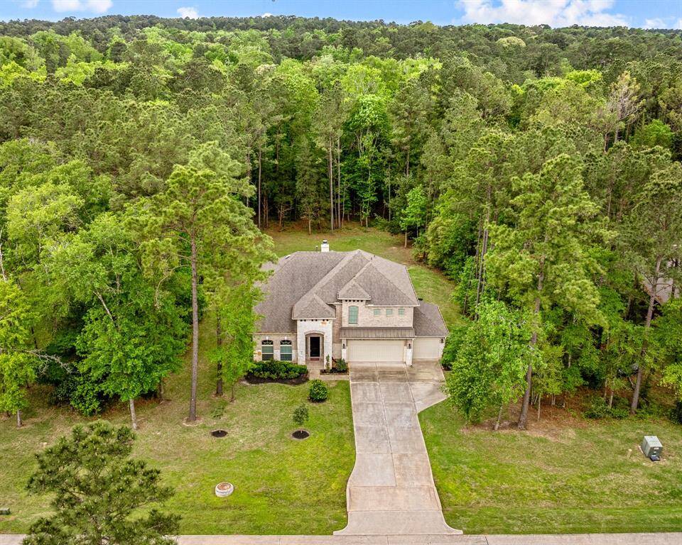 Privacy surrounds this wonderful home.