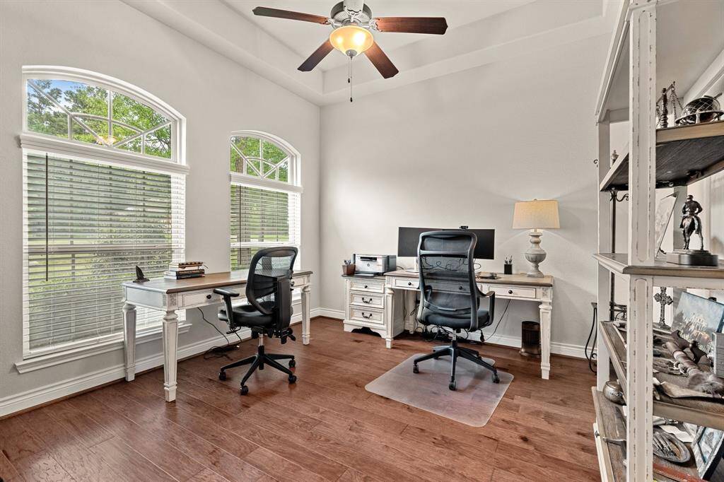 Large home office with natural light facing the quiet street.