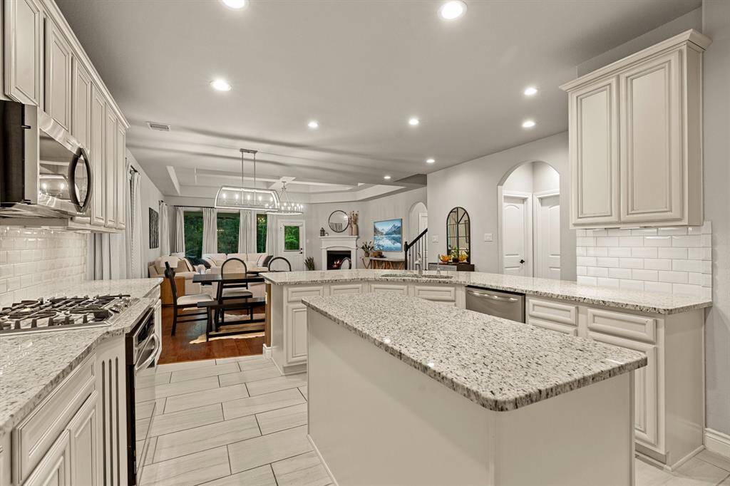 The kitchen overlooks the dining and living areas