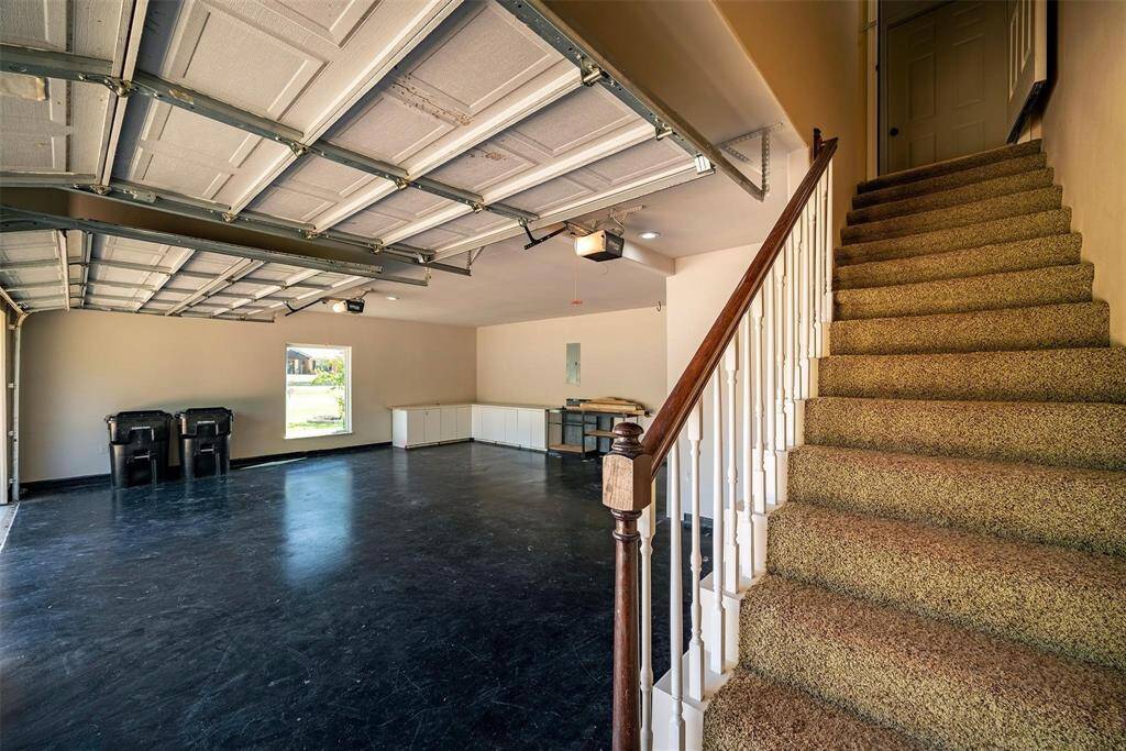 Stairs leading to an additional 450-SF of air-conditioned living space above the garage