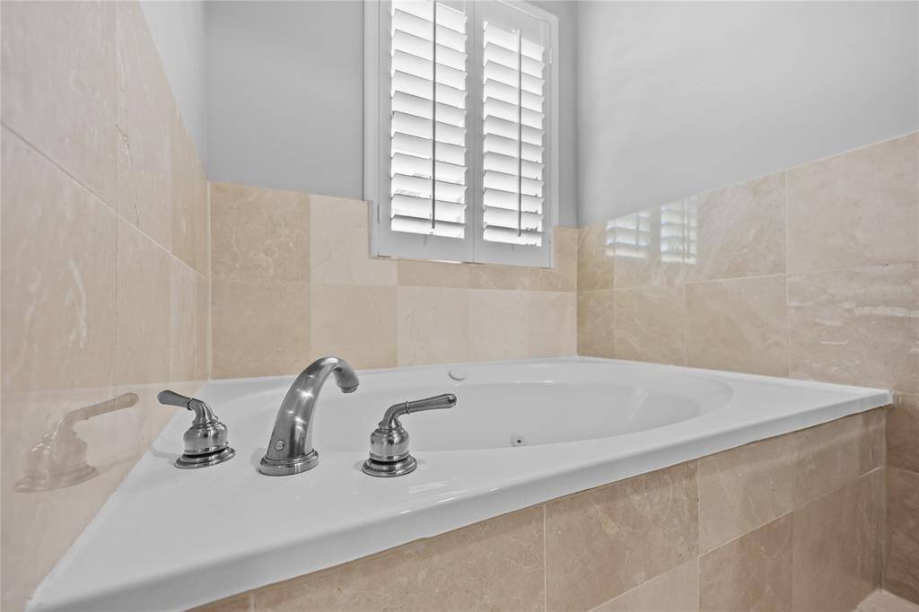 Separate tub in primary bathroom