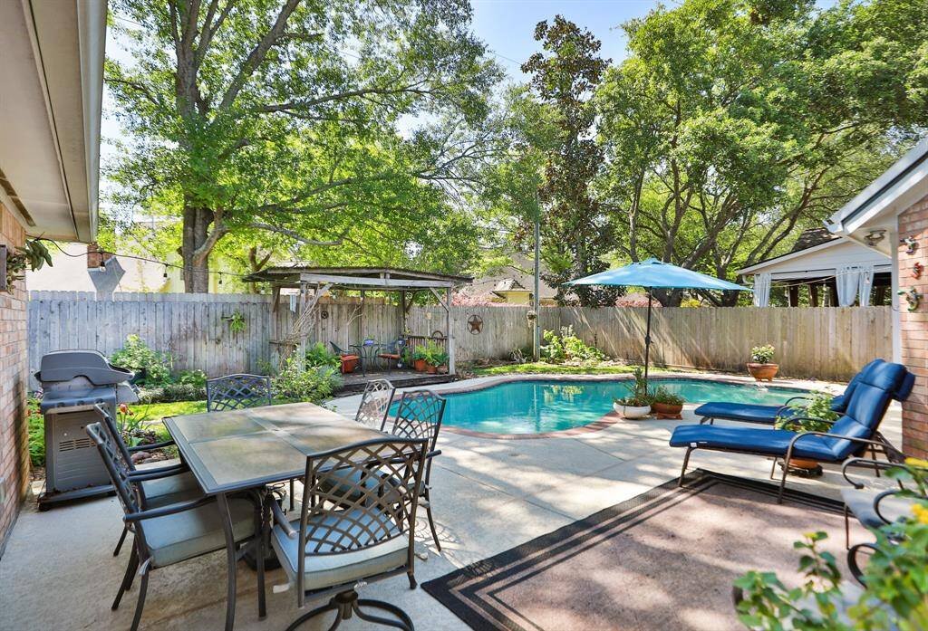 The best PICTURE! Look at those beautiful mature trees and your new pool!