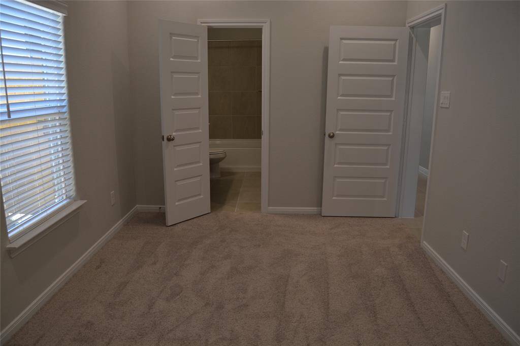 Primary bedroom and bathroom